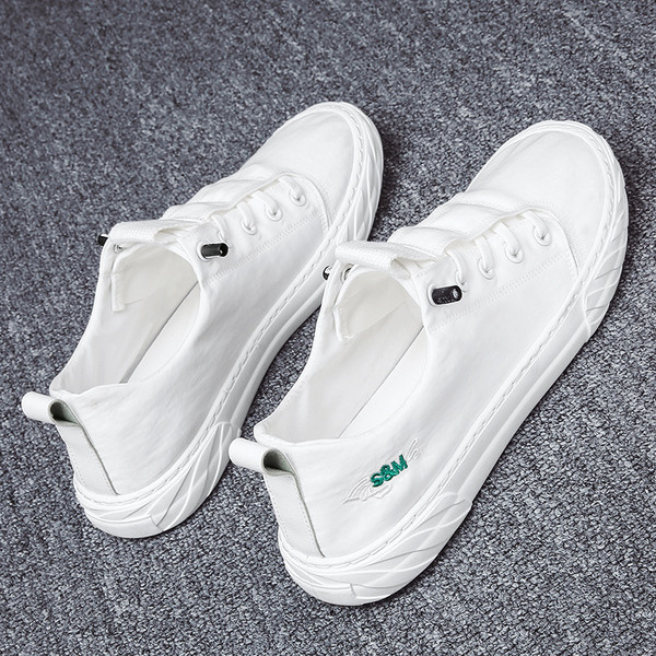 Tekstiilist tikanditega meeste sporditossud