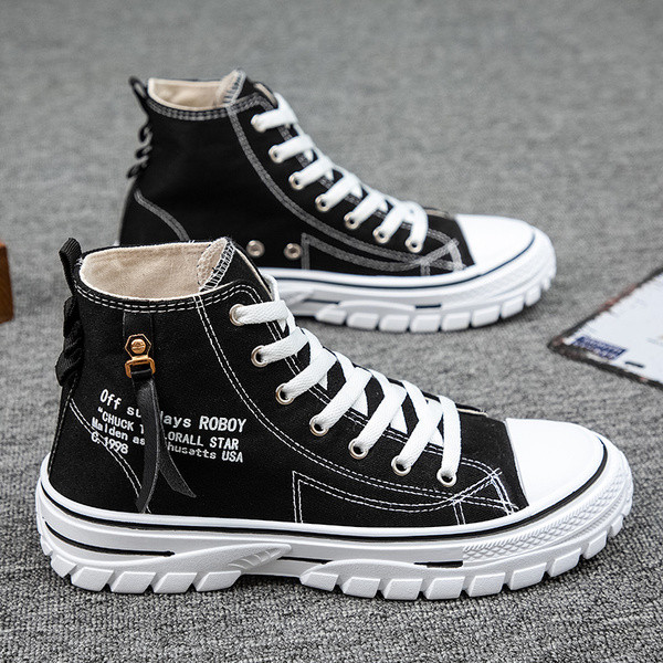 Kolmes värvitoonis paelte ja lameda tallaga moodsad meeste tossud