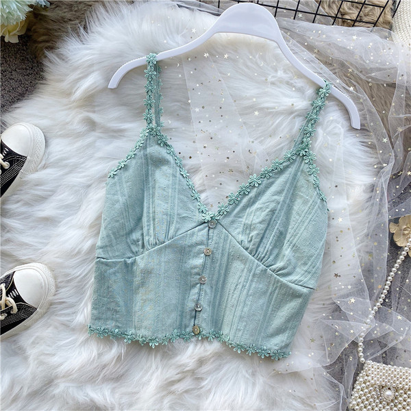 Moodne naiste lühike rinnakorv nööpide ja spitsikaelusega