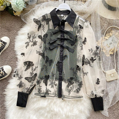 Modern női ing hímzéssel, széles ujjakkal