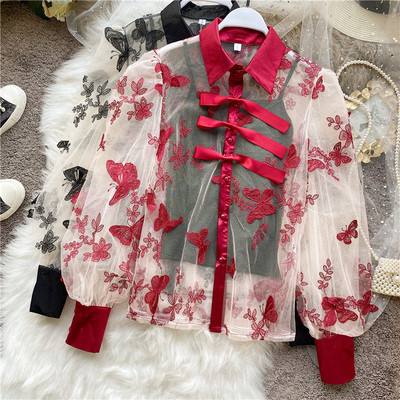 Modern női ing hímzéssel, széles ujjakkal