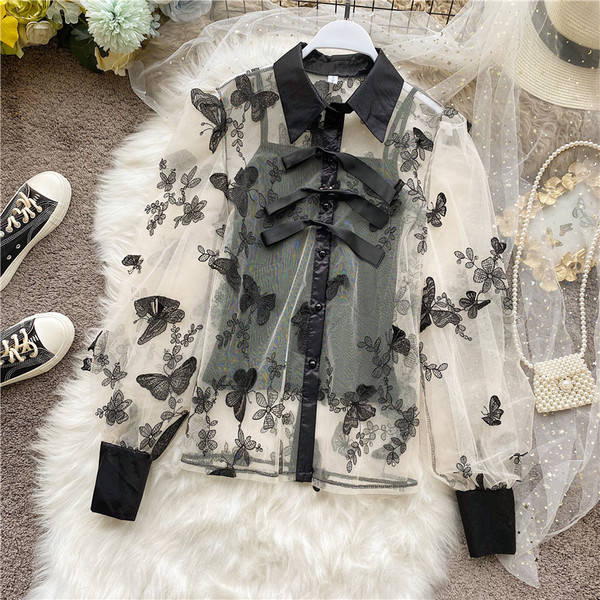 Modern női ing hímzéssel, széles ujjakkal