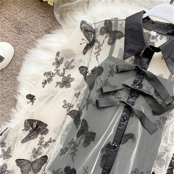 Modern női ing hímzéssel, széles ujjakkal