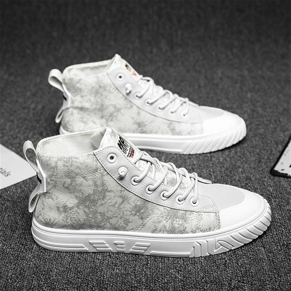 Uus mudel paelte ja mustriga meeste tossud