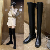 Magas női csizma sima modell lapos talppal és fűzővel