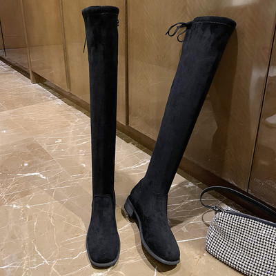 Magas női csizma sima modell lapos talppal és fűzővel