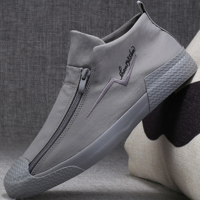 Uus tõmbluku ja tikandiga sportlike meeste tossude mudel