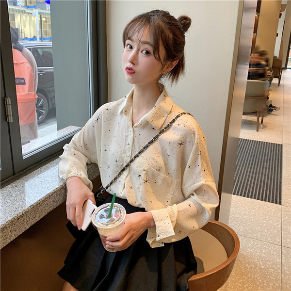 Alkalmi női ing széles modell zsebbel