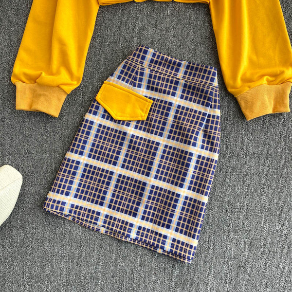 Naiste pikkade varrukatega pluusi ja kõrge vöökohaga seeliku komplekt