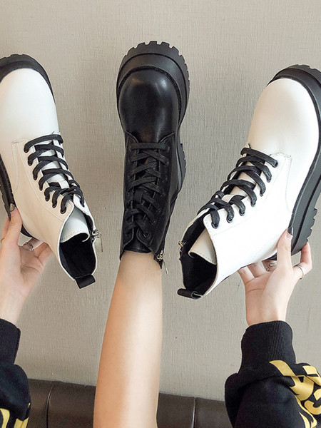 Naiste kõrge talla ja paeltega saapad ökonahast