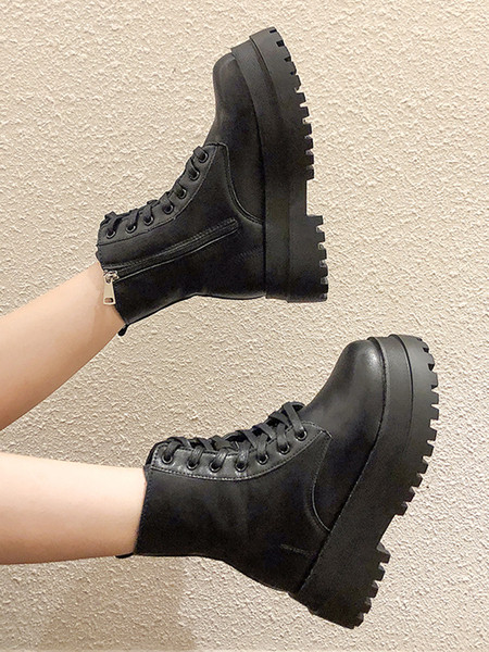 Naiste kõrge talla ja paeltega saapad ökonahast