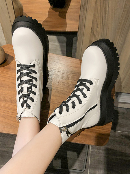 Naiste kõrge talla ja paeltega saapad ökonahast