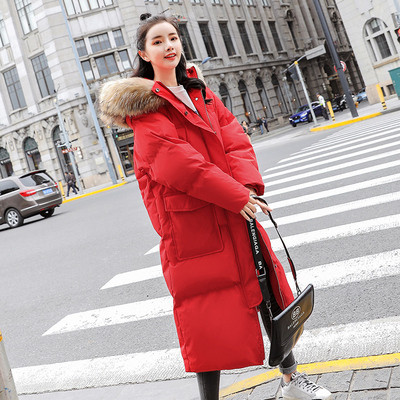 Modern női téli hosszú kabát mély zsebekkel és pehellyel