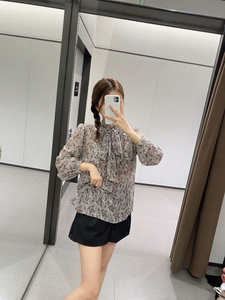 Moodne paelte ja lillemustriga naiste särk