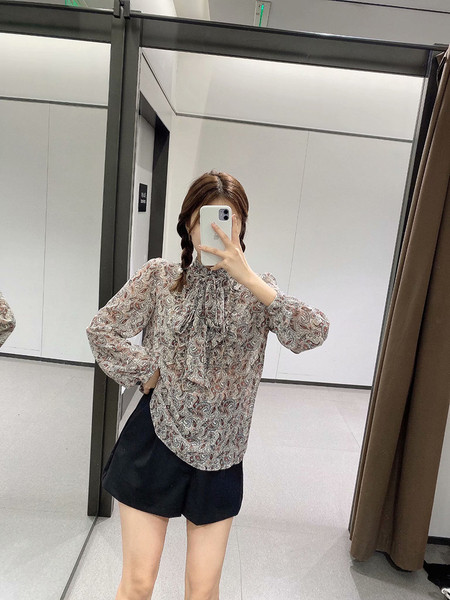 Moodne paelte ja lillemustriga naiste särk