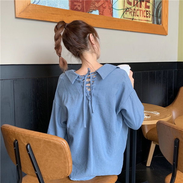 Modern női ing klasszikus gallérral és széles nyakkendővel