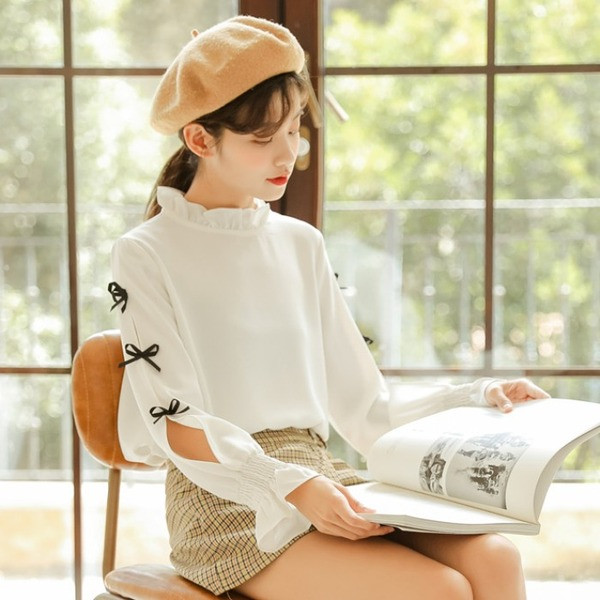 Moodne pikkade varrukatega naiste särk tavaline mudel