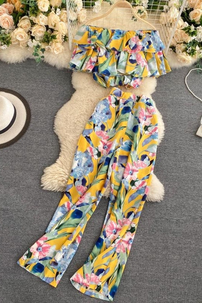 Naiste lühikeste varrukate ja pikkade pükstega pluusikomplekt