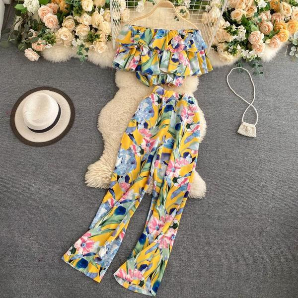 Naiste lühikeste varrukate ja pikkade pükstega pluusikomplekt