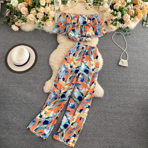 Naiste lühikeste varrukate ja pikkade pükstega pluusikomplekt