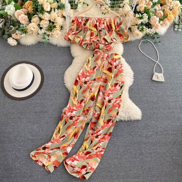 Naiste lühikeste varrukate ja pikkade pükstega pluusikomplekt