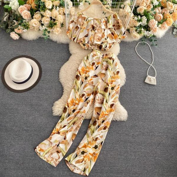 Naiste lühikeste varrukate ja pikkade pükstega pluusikomplekt