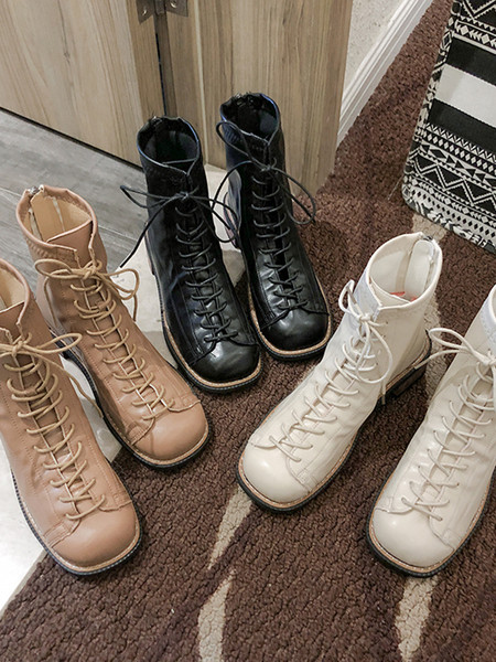 Elegantne ženske čizme od eko kože sa ravnim potplatom i vezicama