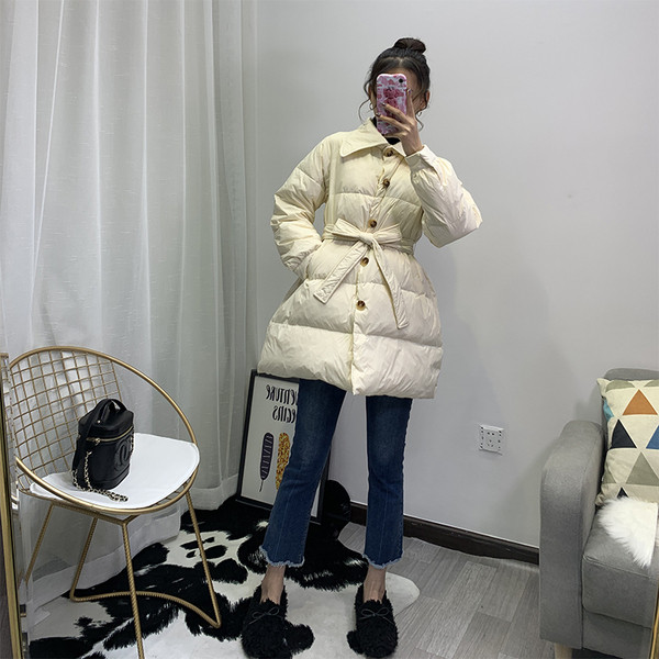 Novi model ženske zimske jakne sa pojasom oko struka