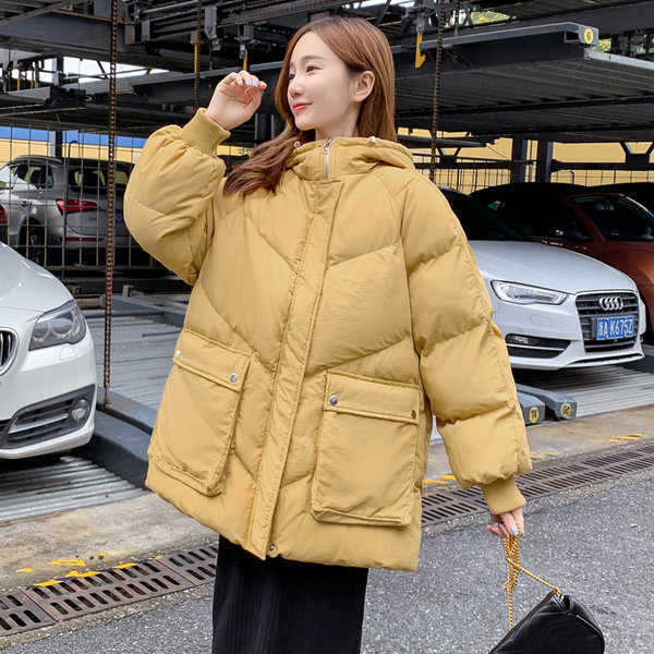 Ženska ležerna jakna širokog modela sa džepovima i kapuljačom