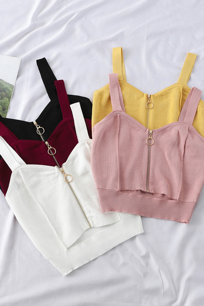 Rövid női felső, széles pántokkal és cipzárral