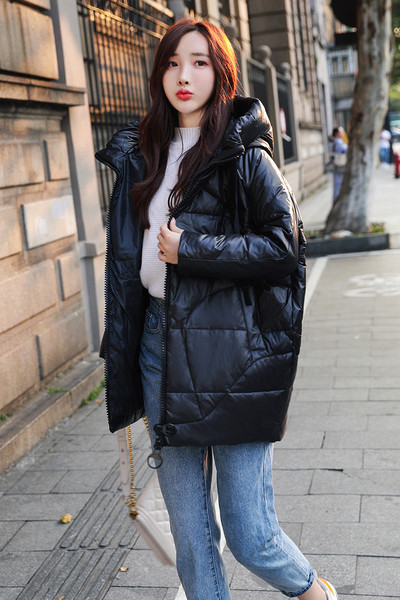 Női téli kabát széles modell kapucnival