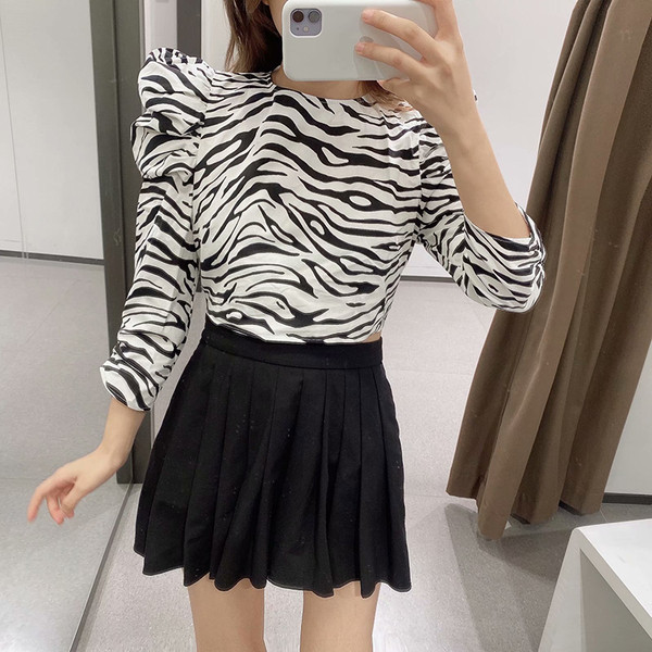 Modern női rövid blúz szalaggal