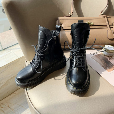 Női csizma cipzárral és fűzős fekete színben