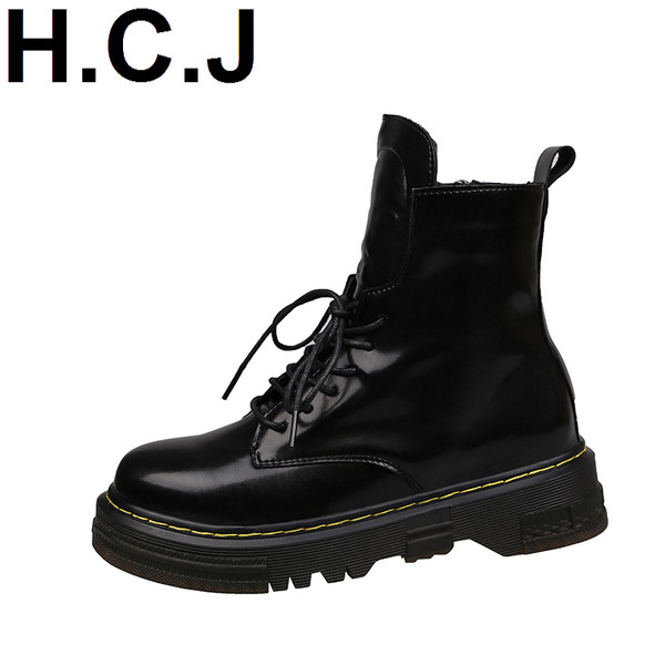 Női csizma cipzárral és fűzős fekete színben