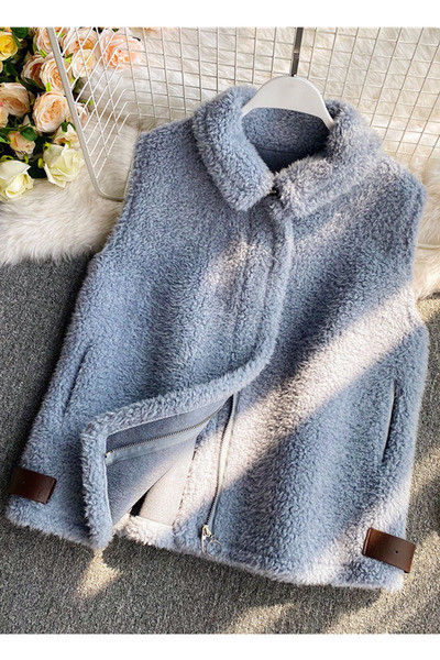 Női pehelymellény cipzárral és zsebekkel