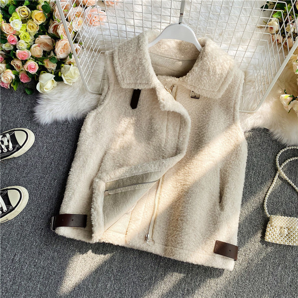 Női pehelymellény cipzárral és zsebekkel