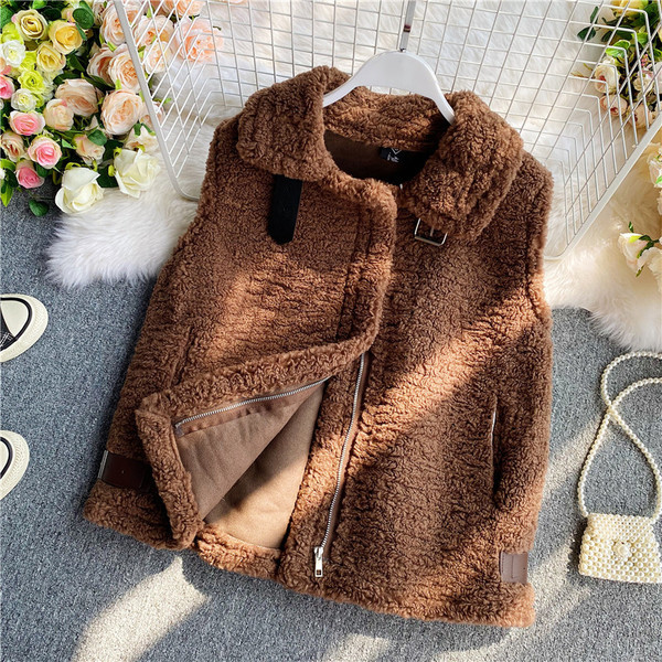 Női pehelymellény cipzárral és zsebekkel