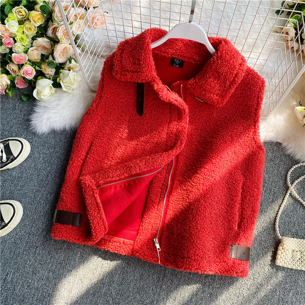 Női pehelymellény cipzárral és zsebekkel