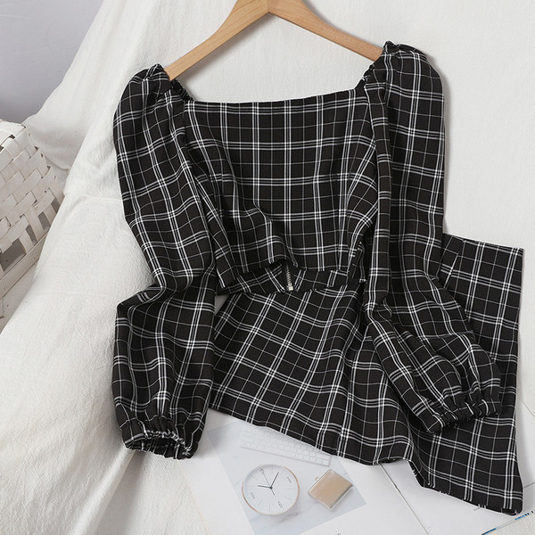 Korszerű női szett hosszú ujjú blúzból és magas derekú szoknyából