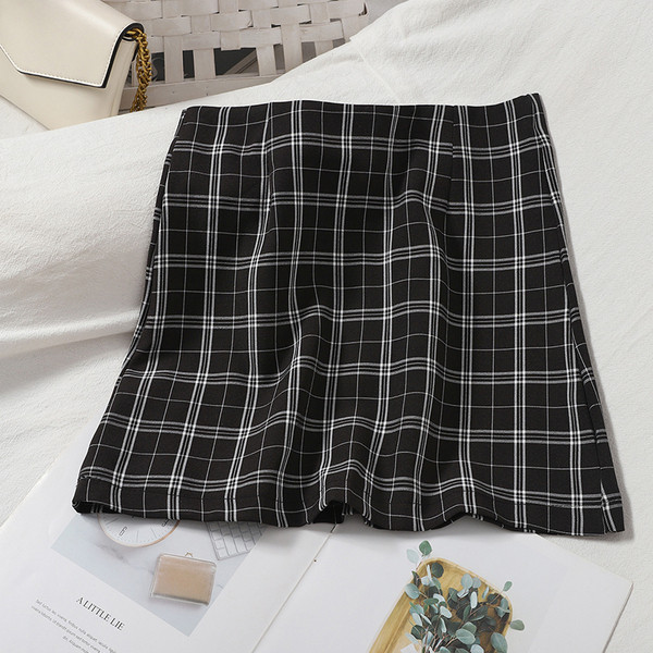 Korszerű női szett hosszú ujjú blúzból és magas derekú szoknyából