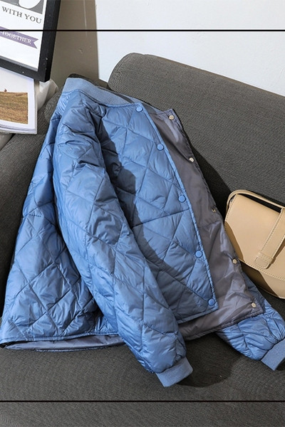 Női alkalmi kabát zsebekkel