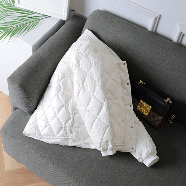 Női alkalmi kabát zsebekkel