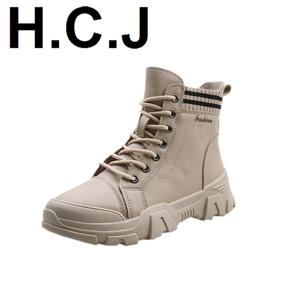 Alkalmi női csizma barna és fekete fűzővel