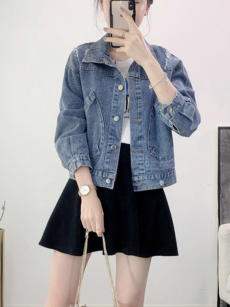 Lezser farmerdzseki szakadt motívumokkal és zsebekkel