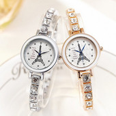 Női karóra kövekkel és fém szíjjal