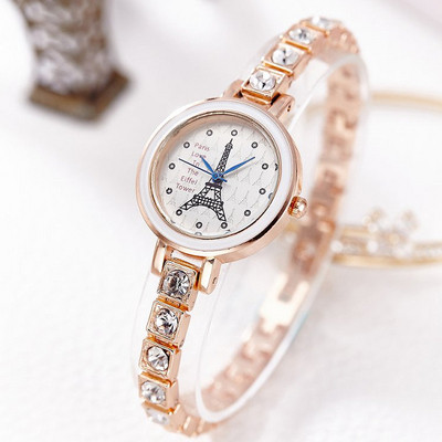 Női karóra kövekkel és fém szíjjal