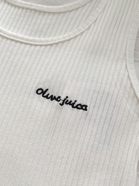 Tikandite ja ümara kaelusega igapäevane naiste topp