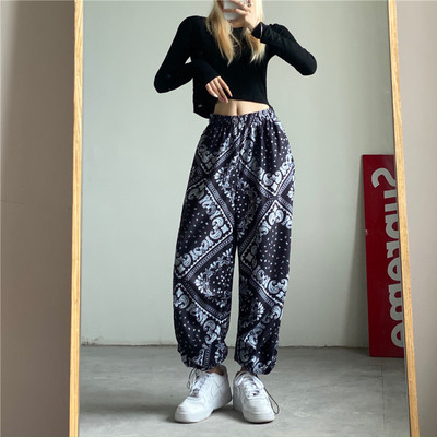 Női aktuális széles, hosszú nadrág, magas derékkal