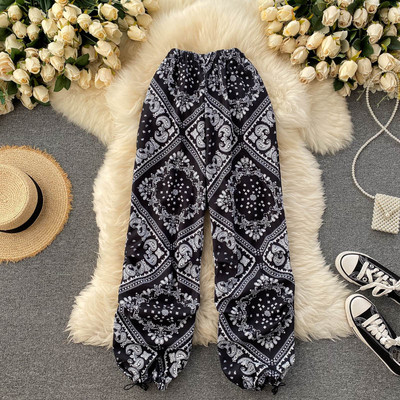 Naiste vabaaja püksid kummikuga vöökohal ja pahkluudel