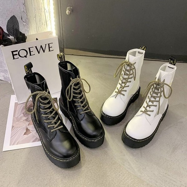 Hitid kõrge talla ja värviliste paeltega naiste nahksaapad